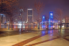 Nightime view of illuminated Main Street Bridge and Jacksonville urban skyline