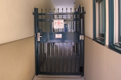 Closed gate showing key card access to rooms