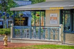 Side of Uptown Diner with entrance walkway